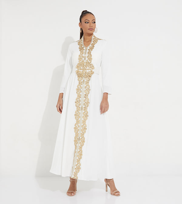 Golden embroidery line in the meddle of kaftan