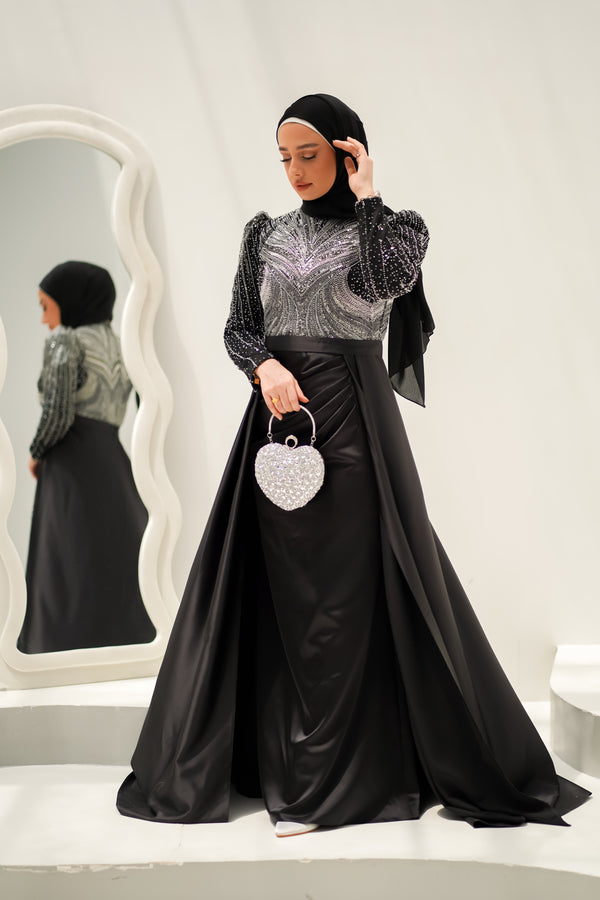 سحر الليل – فستان سهرة أسود بلمسات كريستالية