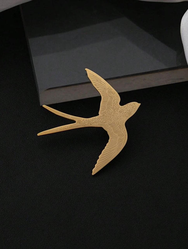 gold bird brooch